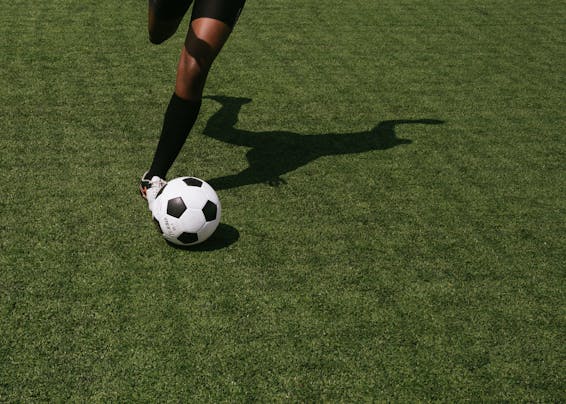 Anonymous soccer player on field during match