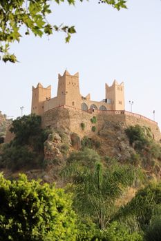 A scenic view of a historic fortress on a hill in Béni Mellal, Morocco.