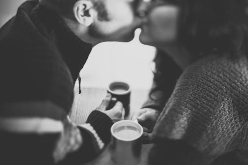 Free Grayscale Photo of Couple Kissing Stock Photo