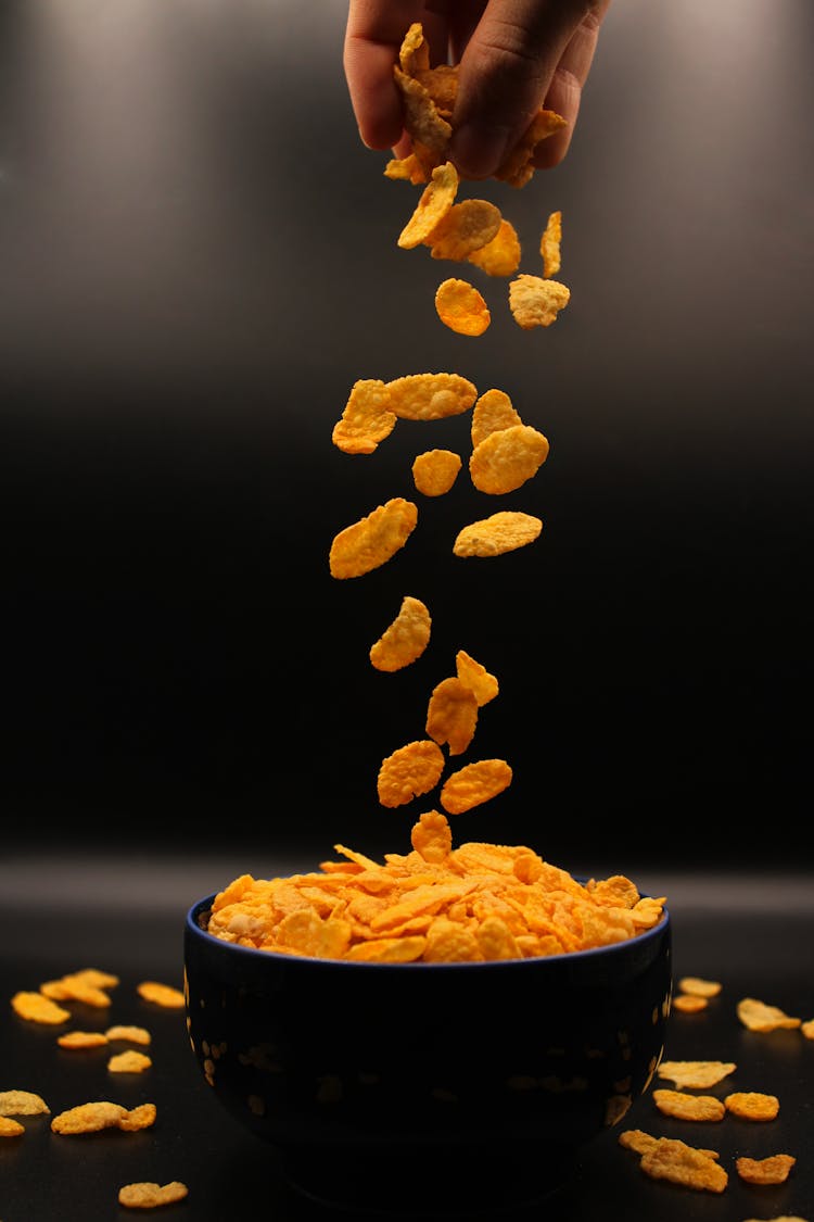 Corn Flakes In Black Ceramic Bowl