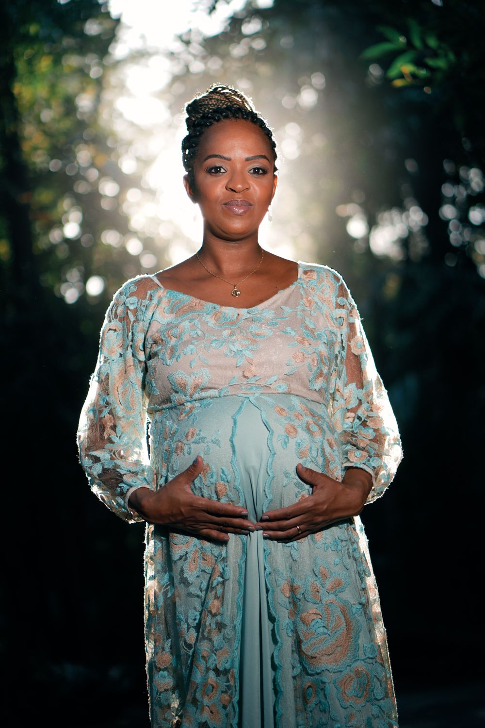 Maternity portrait in an elegant lace dress