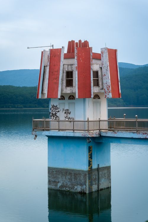 Free A striking architectural structure on Xuan Huong Lake, showcasing distinctive design and vibrant colors. Stock Photo