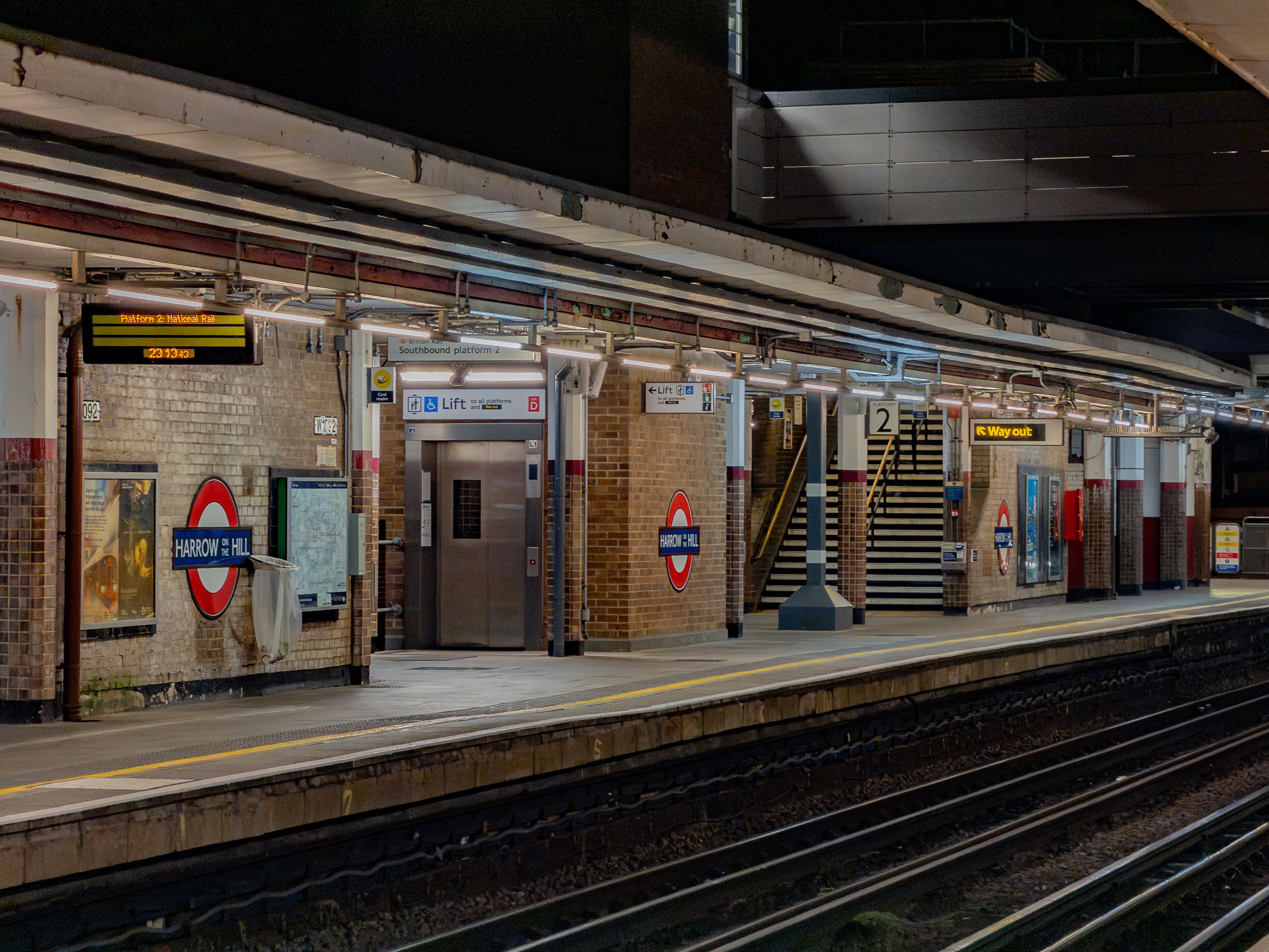 Harrow on the Hill station's serene ambiance at night on the Metropolitan line in London.