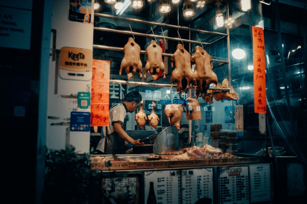 Cantonese roast meat shopfront with hanging roast duck