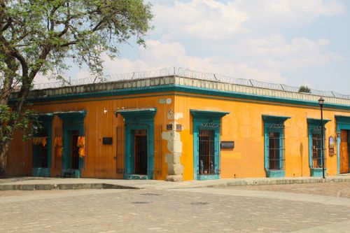 Free A colorful colonial-style building in Oaxaca City, showcasing traditional Mexican architecture. Stock Photo