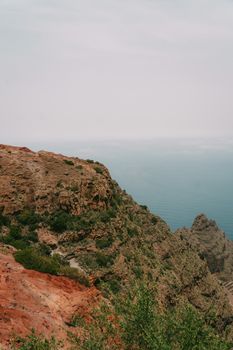 Explore the dramatic volcanic cliffs of Agulo, Spain, with a panoramic view of the Atlantic Ocean.