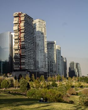 Panoramic view of modern skyscrapers against a clear sky in Santa Fe, Mexico City.