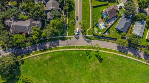 Free Drone shot of a green suburban neighborhood in Florida, showcasing houses and streets. Stock Photo