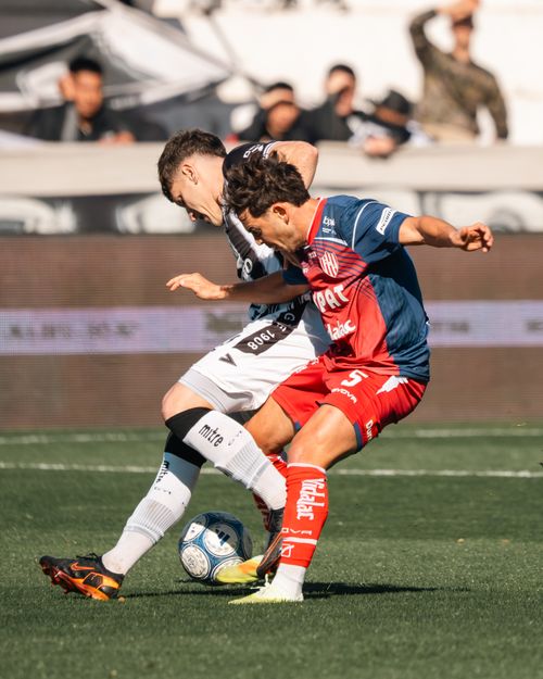 Free Dynamic close-up of soccer players in an energetic match, showcasing intense gameplay. Stock Photo