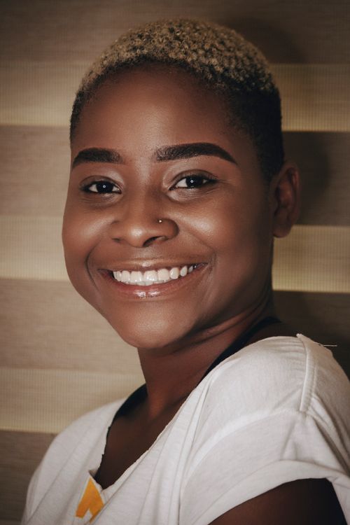 Free Joyful portrait of an African woman with short hair, radiating happiness. Stock Photo