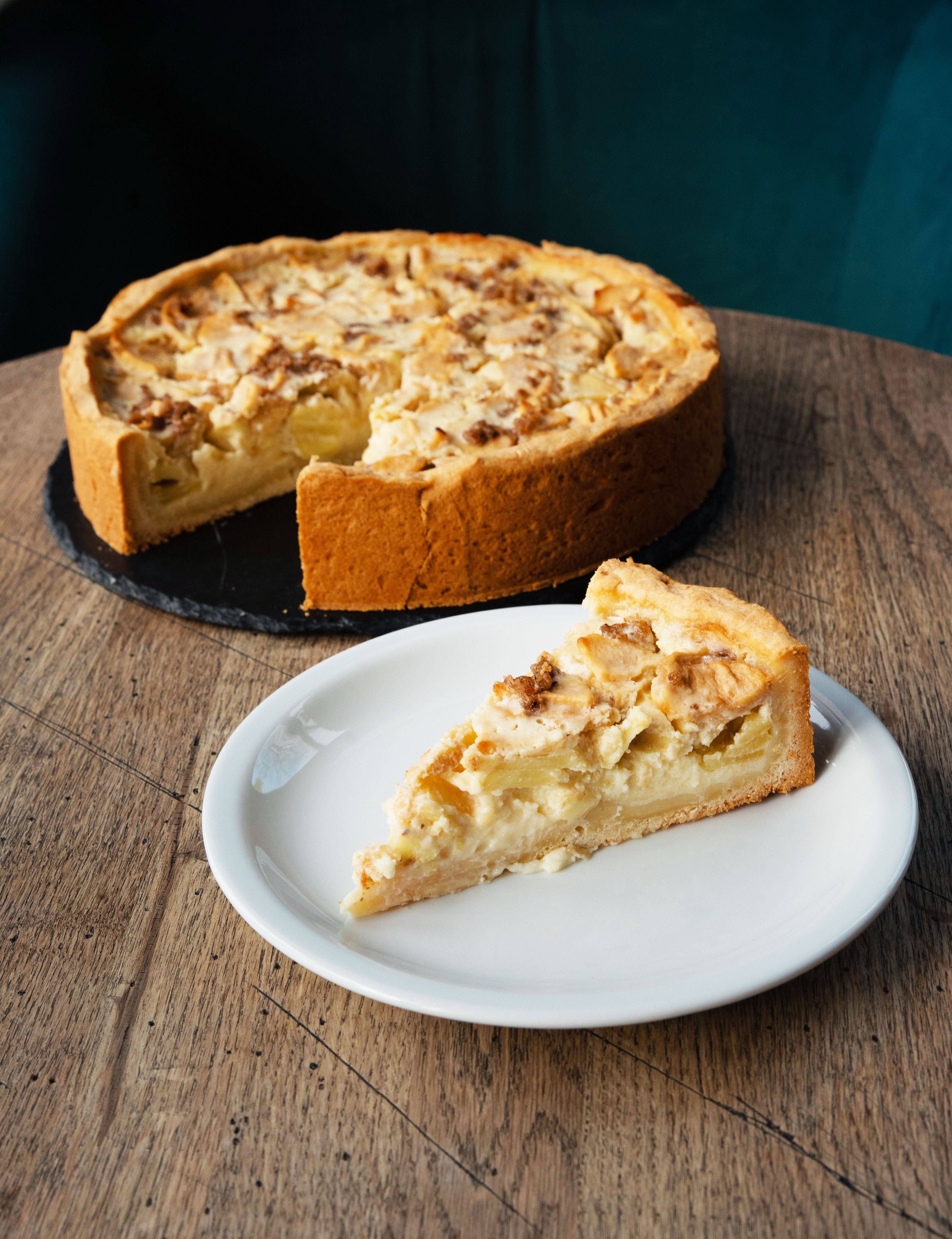 Elegant French apple tart with thinly sliced apples, flavoured with cinnamon & vanilla