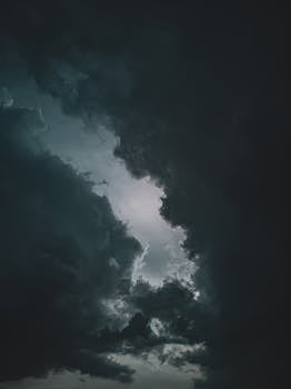 Moody and dramatic cloudscape captured during a thunderstorm, featuring dark clouds.