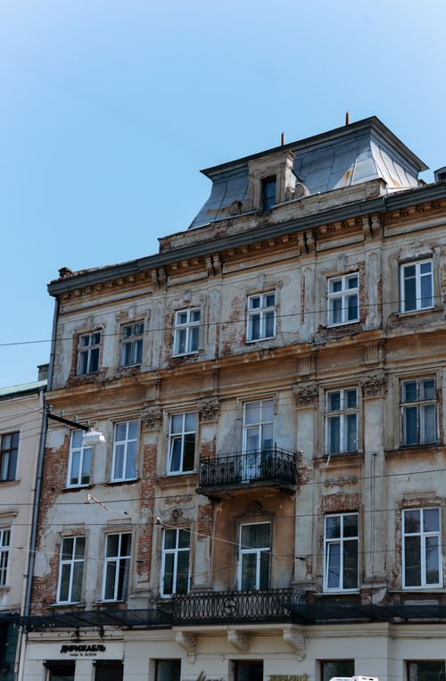 Free Photo of a vintage building facade in Lviv capturing old-world charm and architectural details. Stock Photo