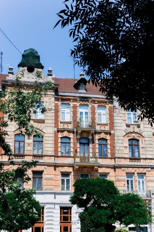 Free A beautifully detailed historic building facade in Lviv, Ukraine, captured on a sunny day. Stock Photo
