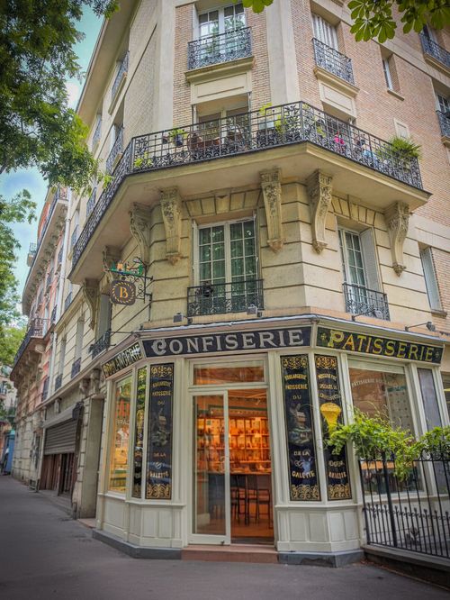 Free A picturesque Parisian corner showcasing a patisserie with classic charm. Stock Photo