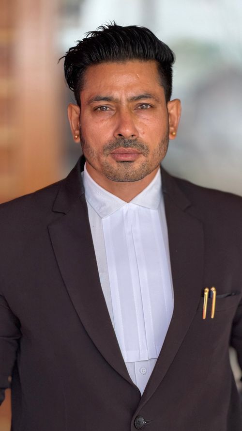 Free Professional male lawyer in a suit standing outdoors confidently. Stock Photo