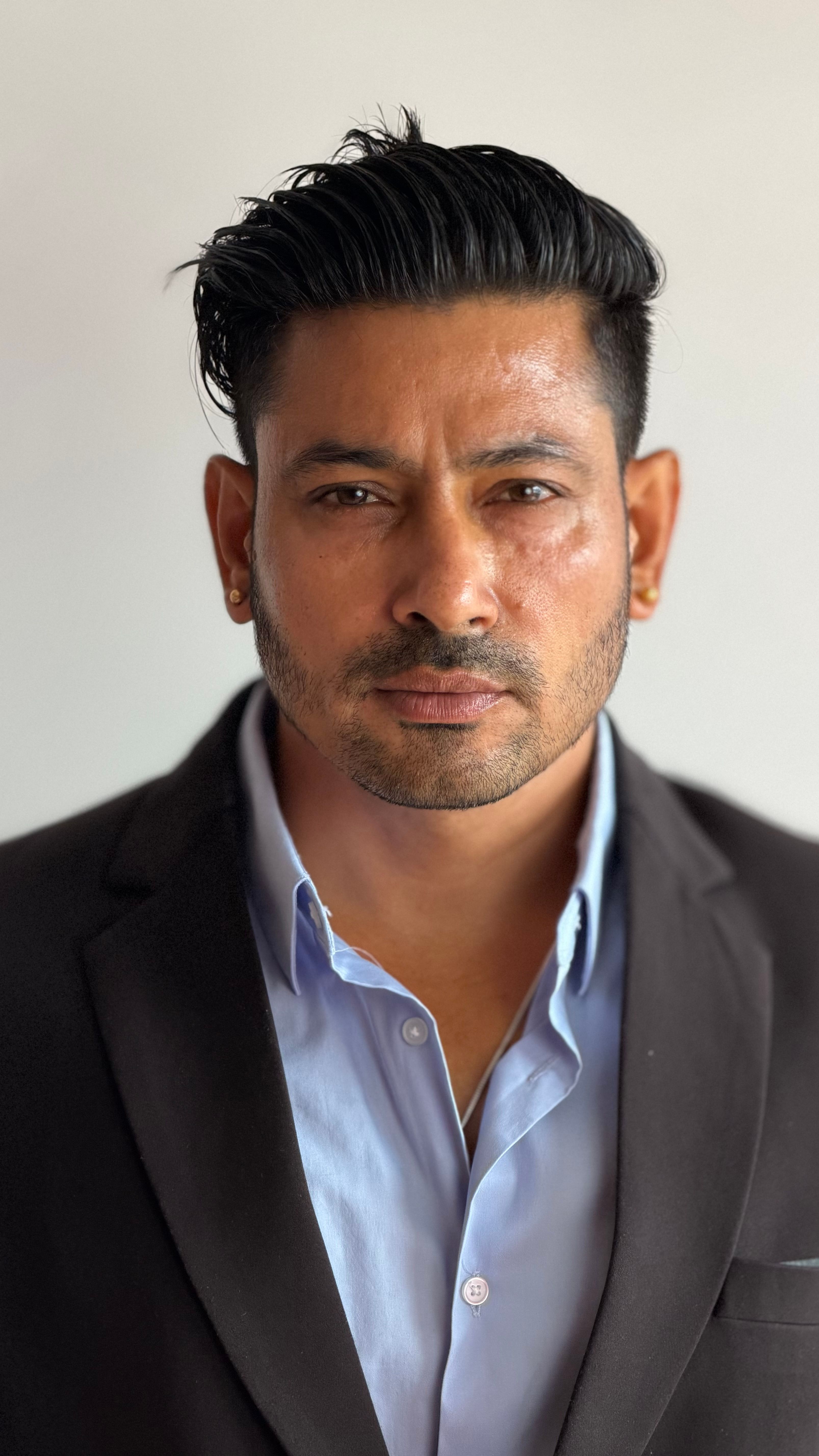 Close-up portrait of a confident businessman in formal attire. Ideal for professional and corporate themes.