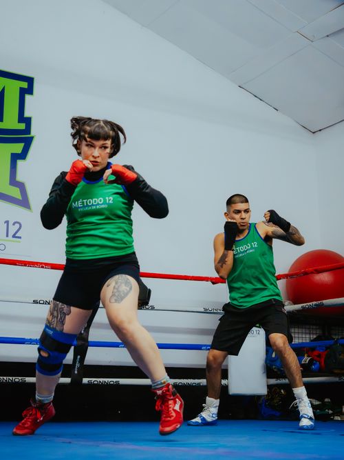 Free Two boxers training in a Buenos Aires gym with intense focus and energy. Stock Photo