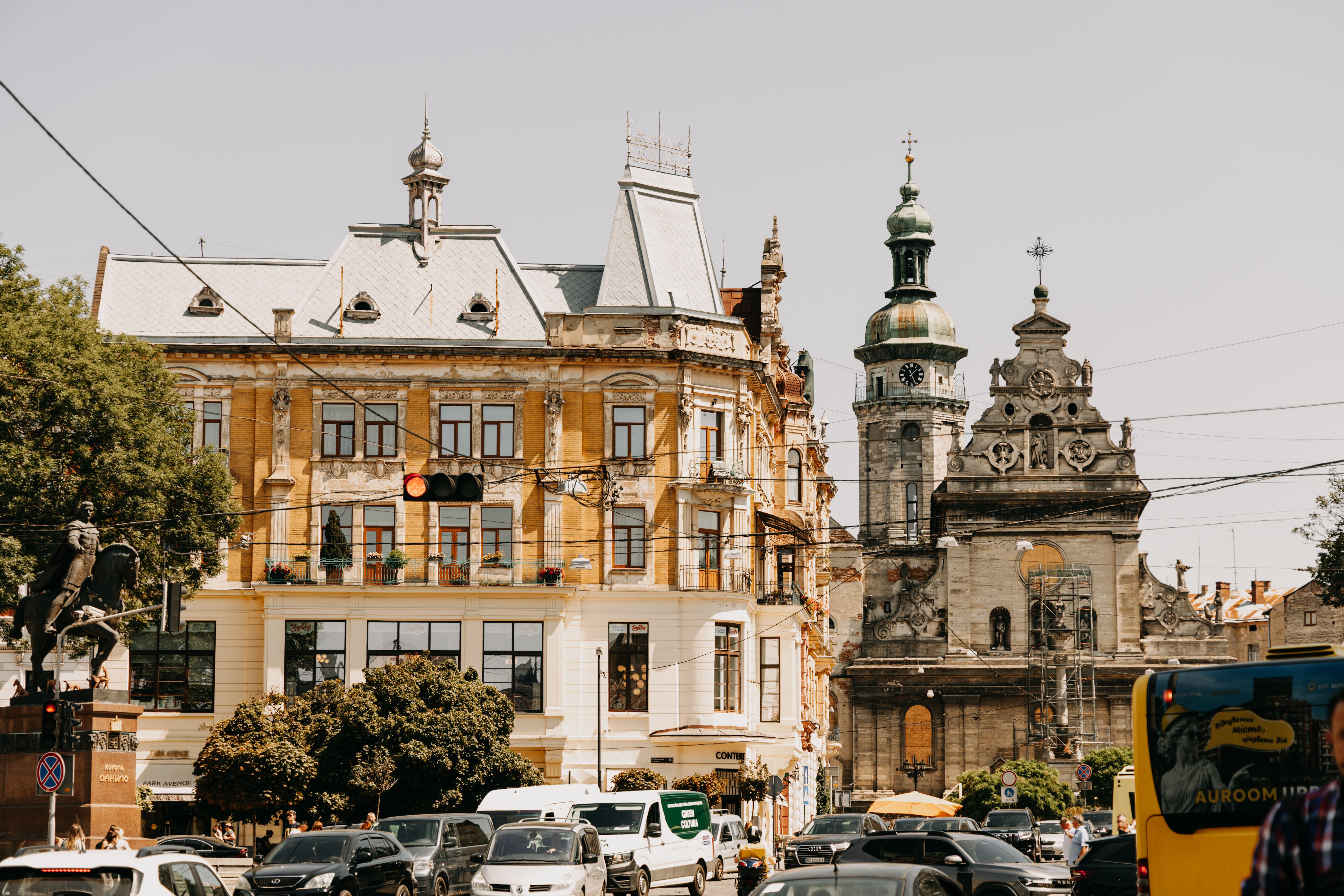 Charming street scene capturing historic architecture in Lviv, Ukraine under a bright day.