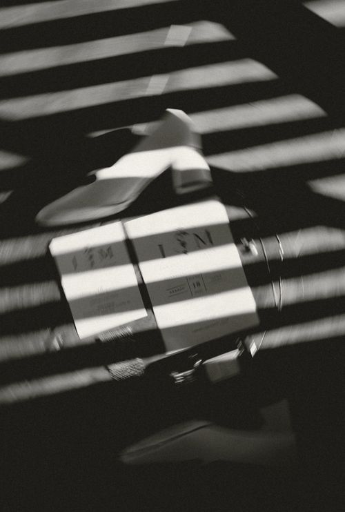Free Artistic black and white image of shadows creating an abstract pattern on objects. Stock Photo