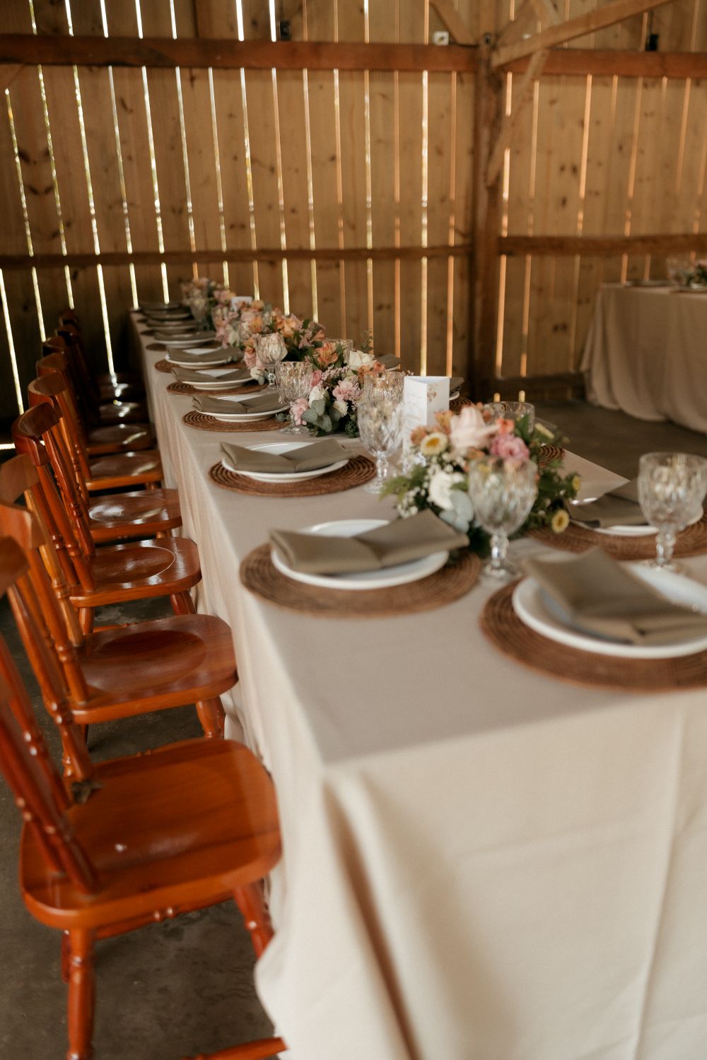 Relaxed rustic table prepared for a post-wedding gathering