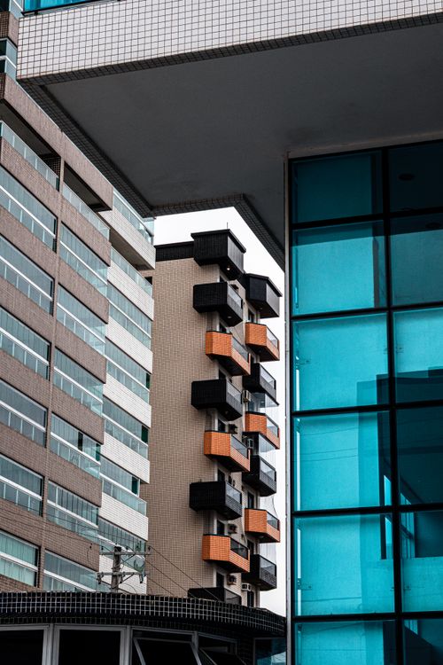 Free Urban architecture featuring sleek modern buildings with geometric design in Praia Grande, Brazil. Stock Photo