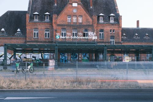 Free A winter view of the historic Berlin-Schöneweide railway station with bicycles and graffiti artwork. Stock Photo