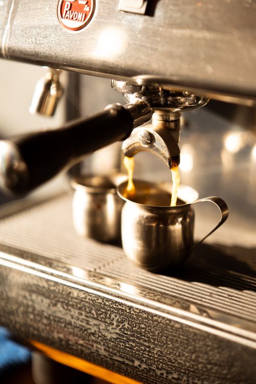 Free A professional espresso machine brewing coffee into stainless steel cups, showcasing detailed barista craftsmanship. Stock Photo