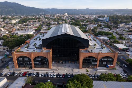 Free Aerial shot of a modern architectural building in San Salvador, El Salvador. Stock Photo