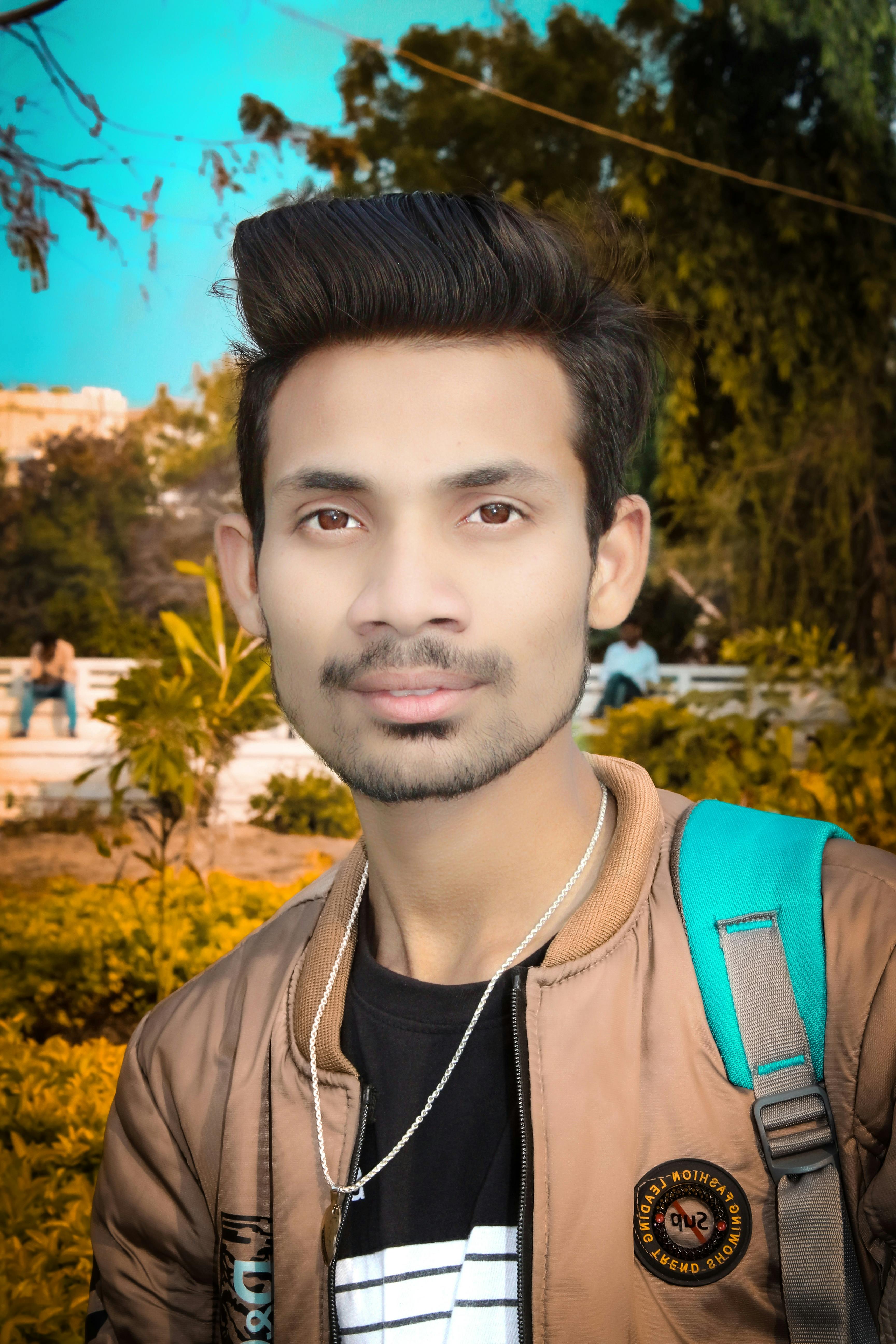 Train moving through scenic countryside at sunset