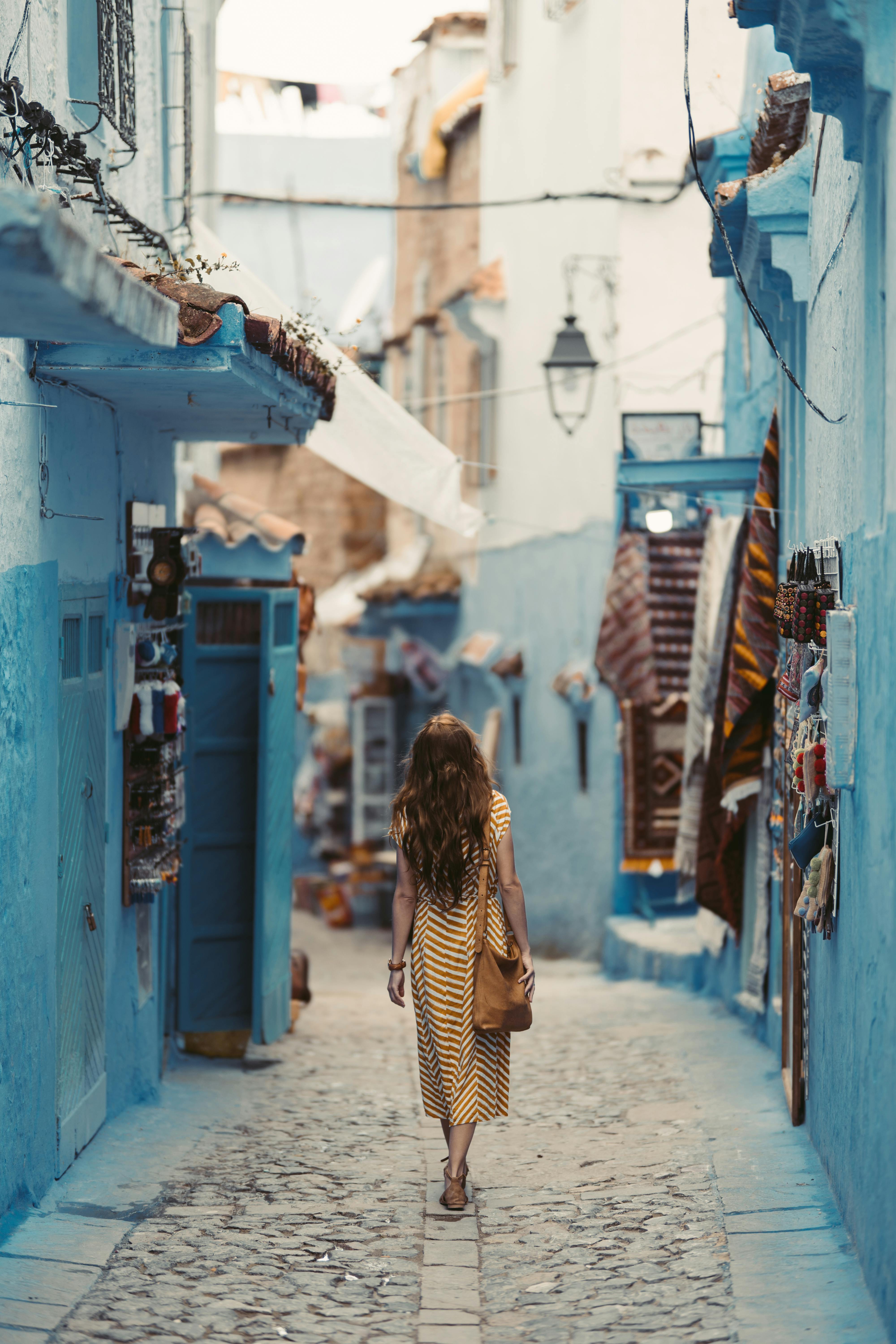 photo of woman wearing yellow dress