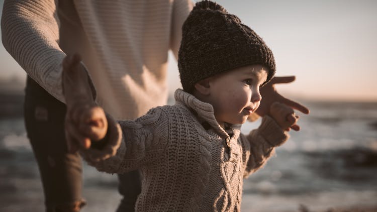 Close-Up Photo Of Baby Wearing Beanie