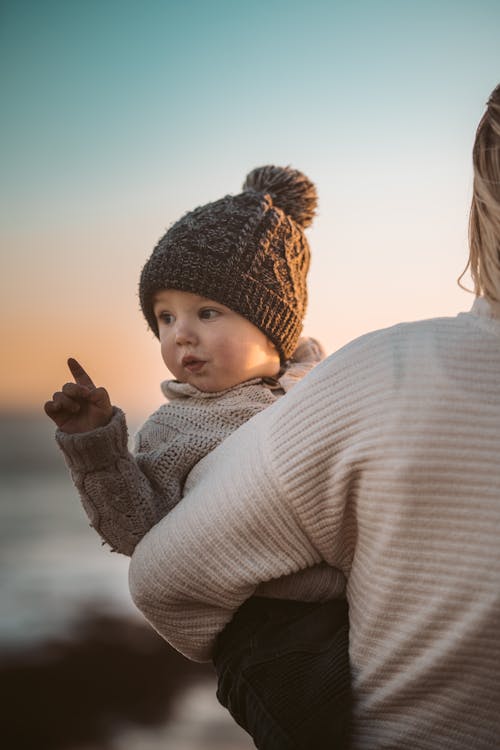 Free Photo of Person Carrying A Baby Stock Photo