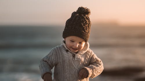 Free Photo Of Toddler Wearing Knitted Sweater Stock Photo