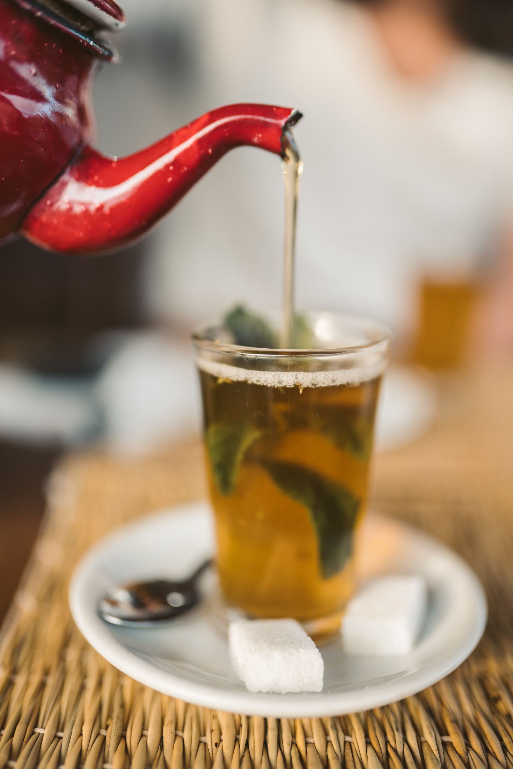 Traditional tea served in a glass with a warm presentation