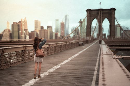 Free Photo Of Woman On Standing On Wooden bridge Stock Photo