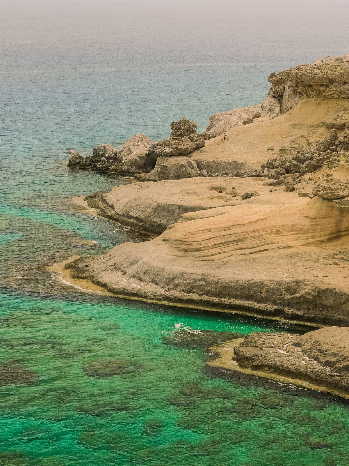 Rocky coastline and turquoise sea in Rhodes Greece