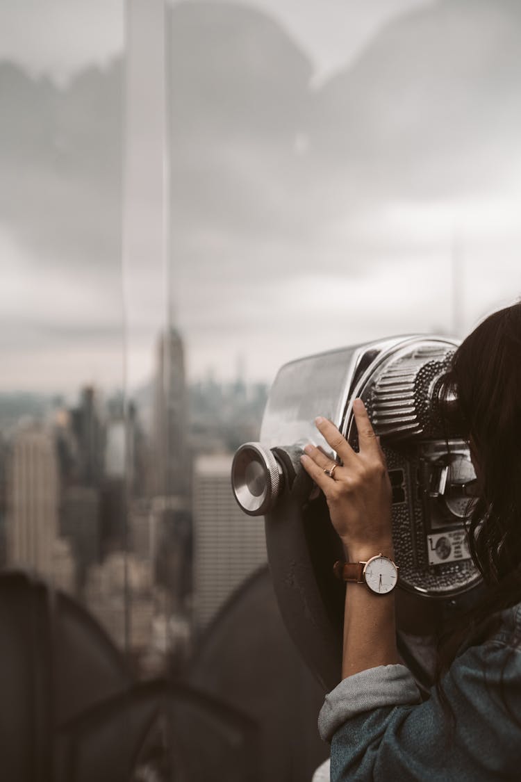 Woman Using A Tower Viewer