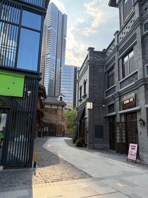 Free Modern architecture blends with traditional buildings in Chongqing's urban landscape. Stock Photo