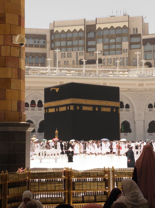 Free A large crowd of pilgrims gathering around the sacred Kaaba in the Grand Mosque, Mecca. Stock Photo