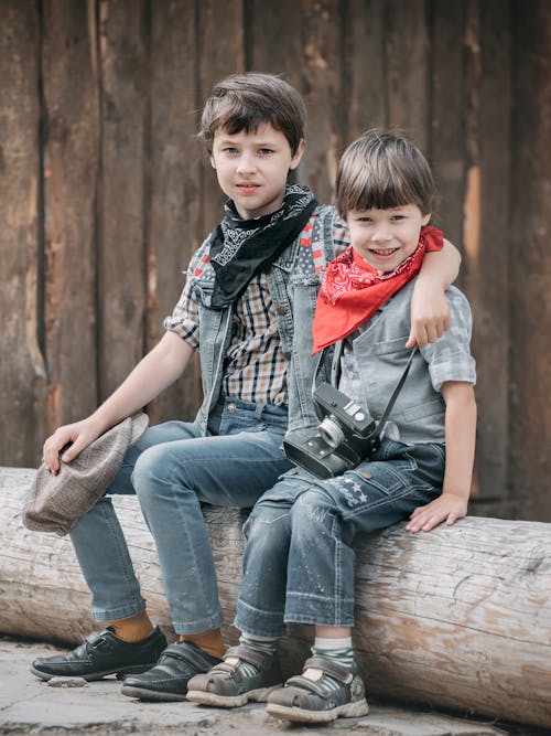 Free Photo Of Boys Sitting Near Each Other Stock Photo