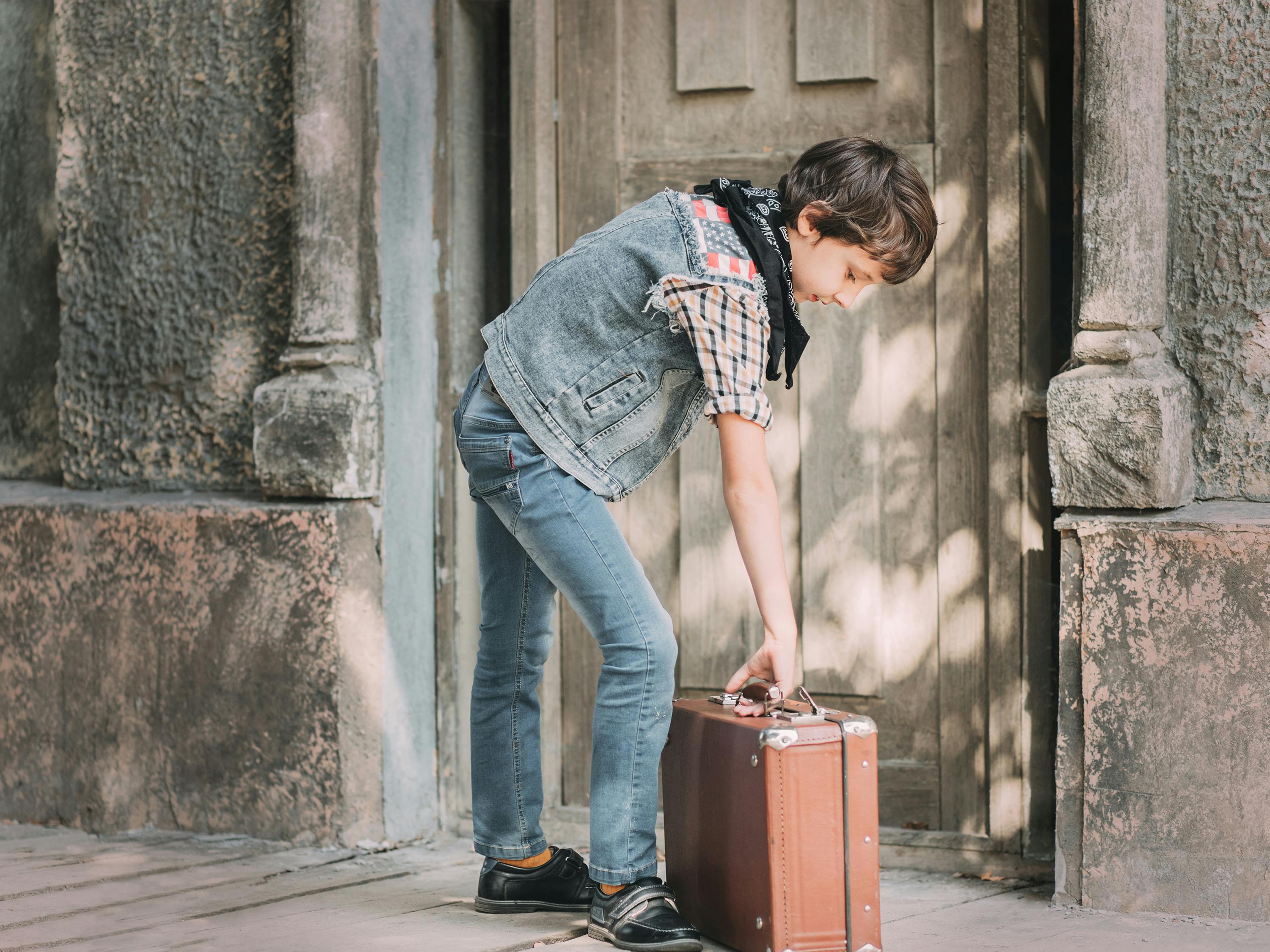 Kid Holding Briefcase Photos, Images and Pictures