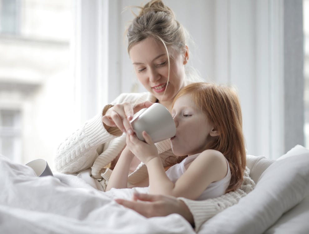 Photo Of Girl Drinking On Mug