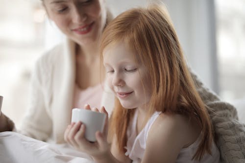 Free Photo Of Girl Holding Ceramic Cup Stock Photo