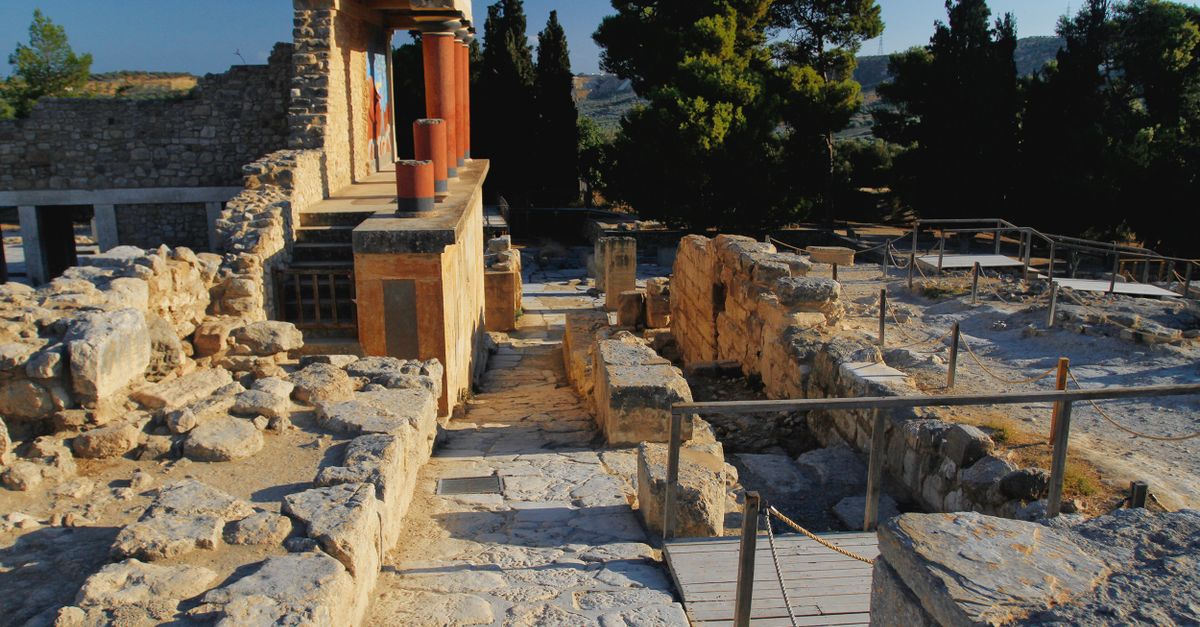 Explore the ancient ruins of Knossos Palace, a significant archaeological site in Greece.
