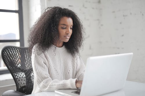 Photo Of Woman Using Laptop