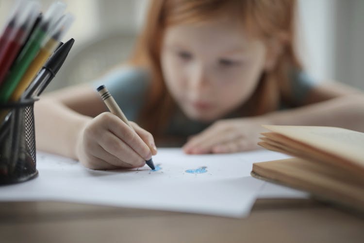  Girl Holding Crayon Coloring White Paper