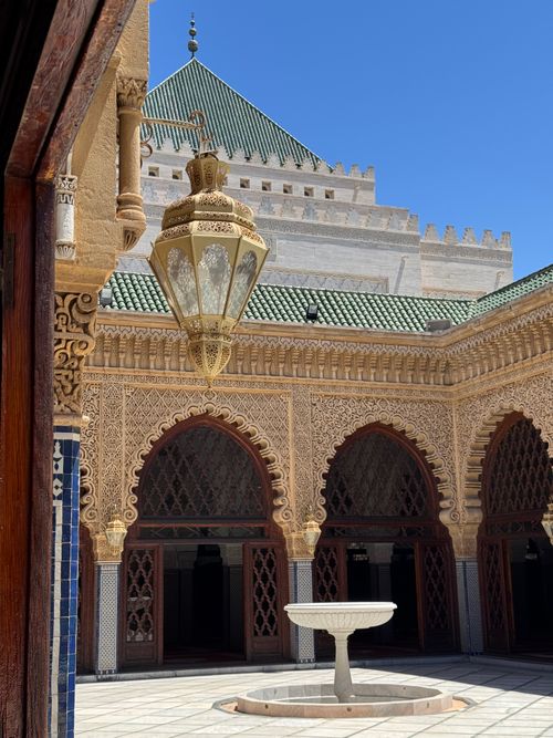 Free Intricately designed courtyard with traditional Moroccan architecture in Rabat during daytime. Stock Photo