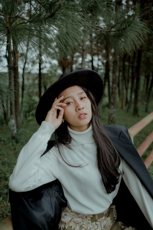 Photo Of Woman Wearing Fedora Hat 