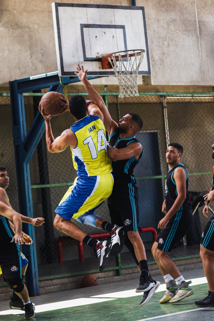 Men Playing Basketball